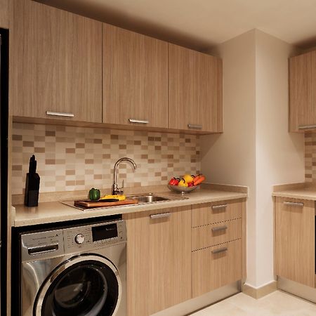 Al Najada Hotel Apartments By Oaks Доха Экстерьер фото