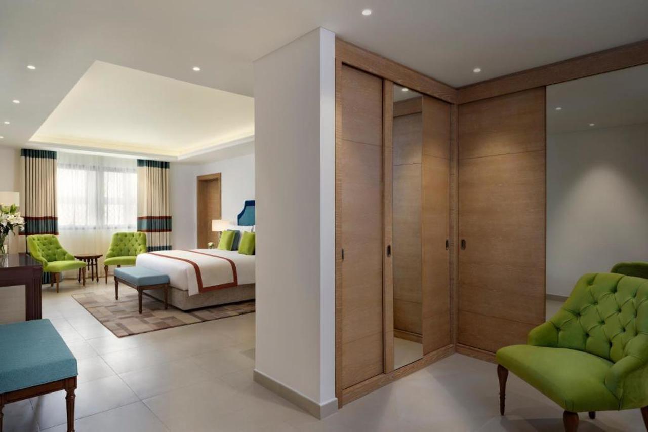 Al Najada Hotel Apartments By Oaks Доха Экстерьер фото